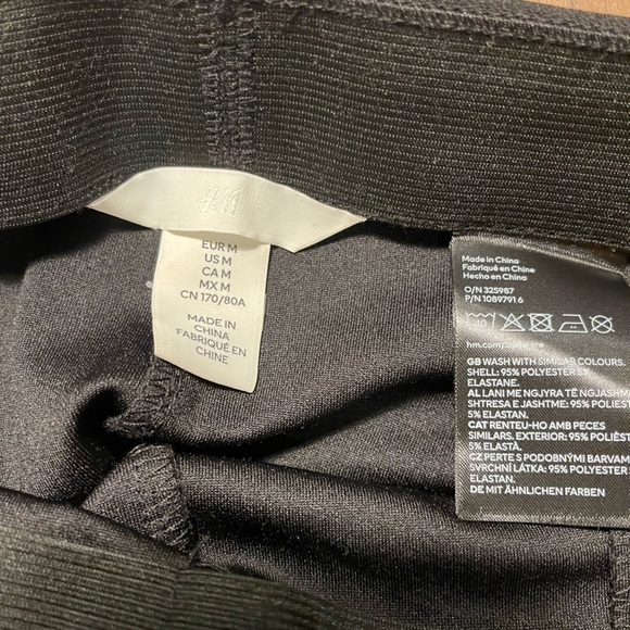 Long black flared pants with slits - Picture 3 of 6